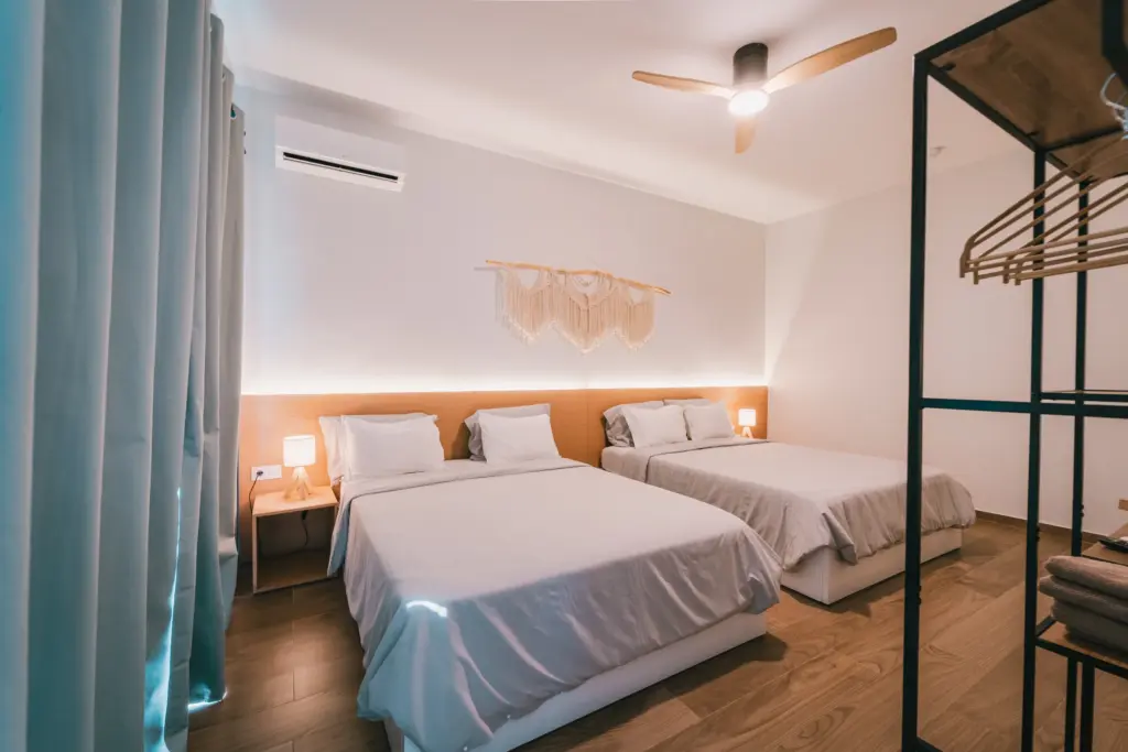 Flexible family room with two beds at Casa Jardim di Sol