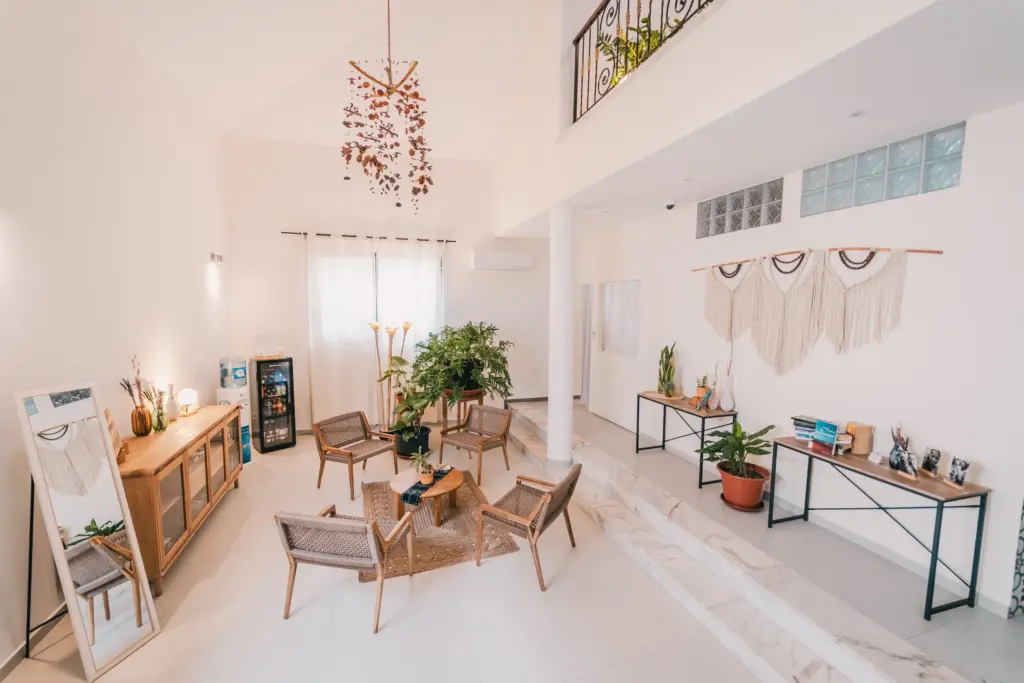 Plant-filled communal lounge at Casa Jardim di Sol